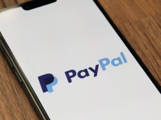 PayPal reports fall in Q1 profit; lowers earnings outlook