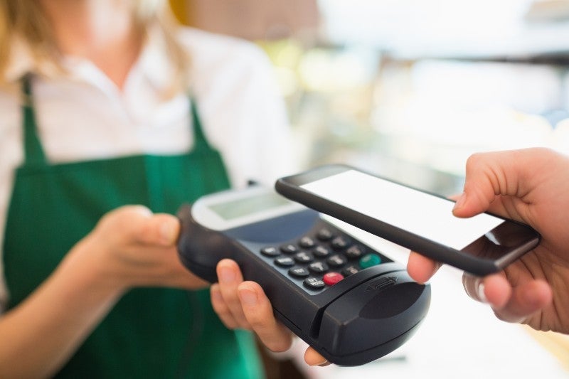 contactless payment made on mobile phone digital wallet